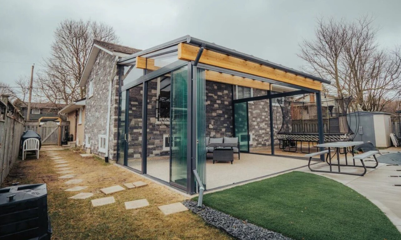 Modern patio enclosure with energy-efficient glass panels