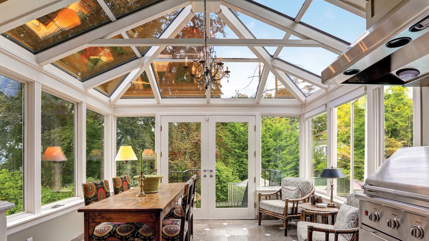 Custom sunroom interior built for Oxnard climate with natural lighting